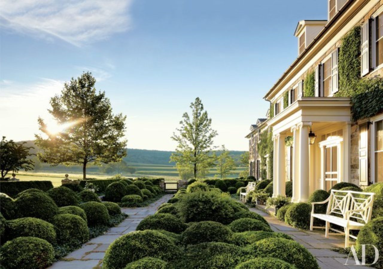 A Dutchess County farmhouse designed by G.P. Schafer Architect with landscape design by Deborah Nevins (Image Source: Architectural Digest / Eric Piasecki)