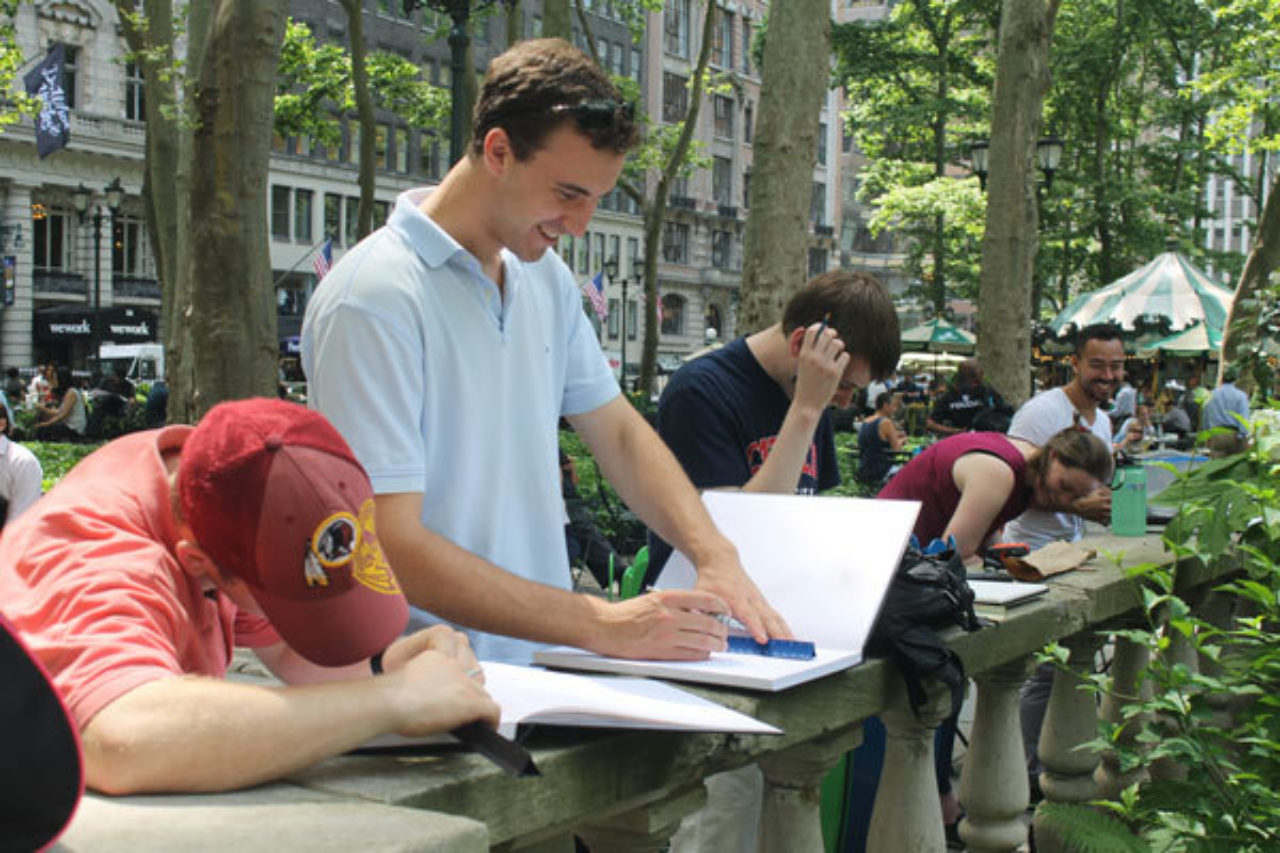 CUA Students Daniel Glasgow, Chas Winebrenner, Andrew Anderson and Tatiana Amundsen sketch on location in Bryant Park during the Summer Studio