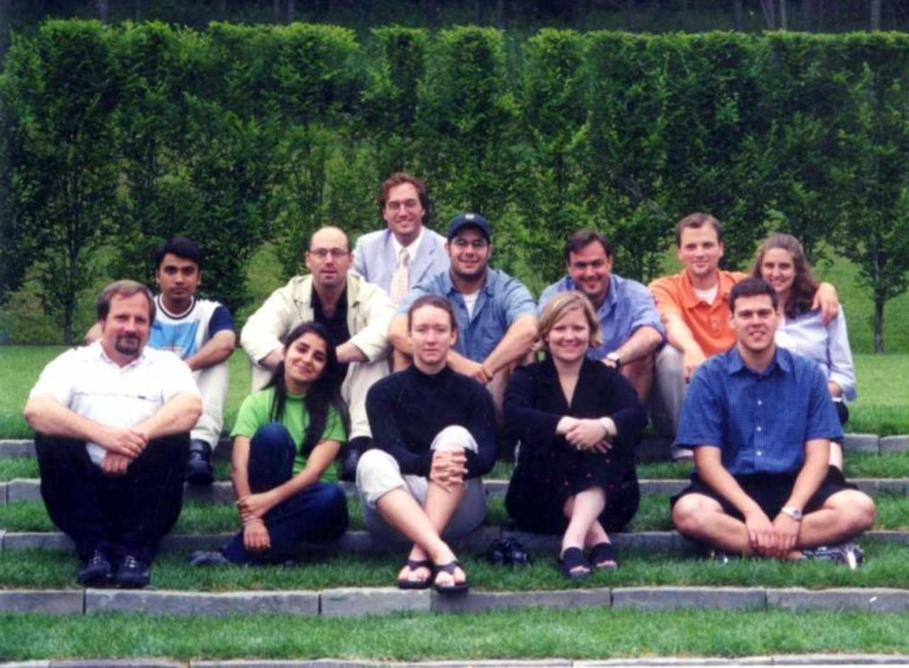 Fellow William Bates in the top row poses with students from the 2001 Summer Program students. Fellow Emeritus Gil Schafer is in the second row, third from right.