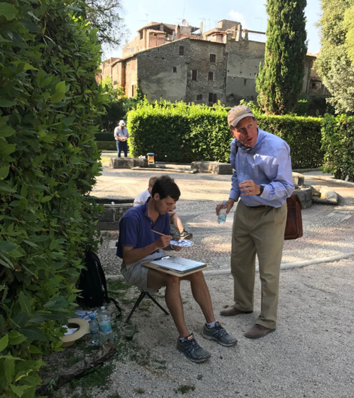 Tour participants sketch on location in Tivoli