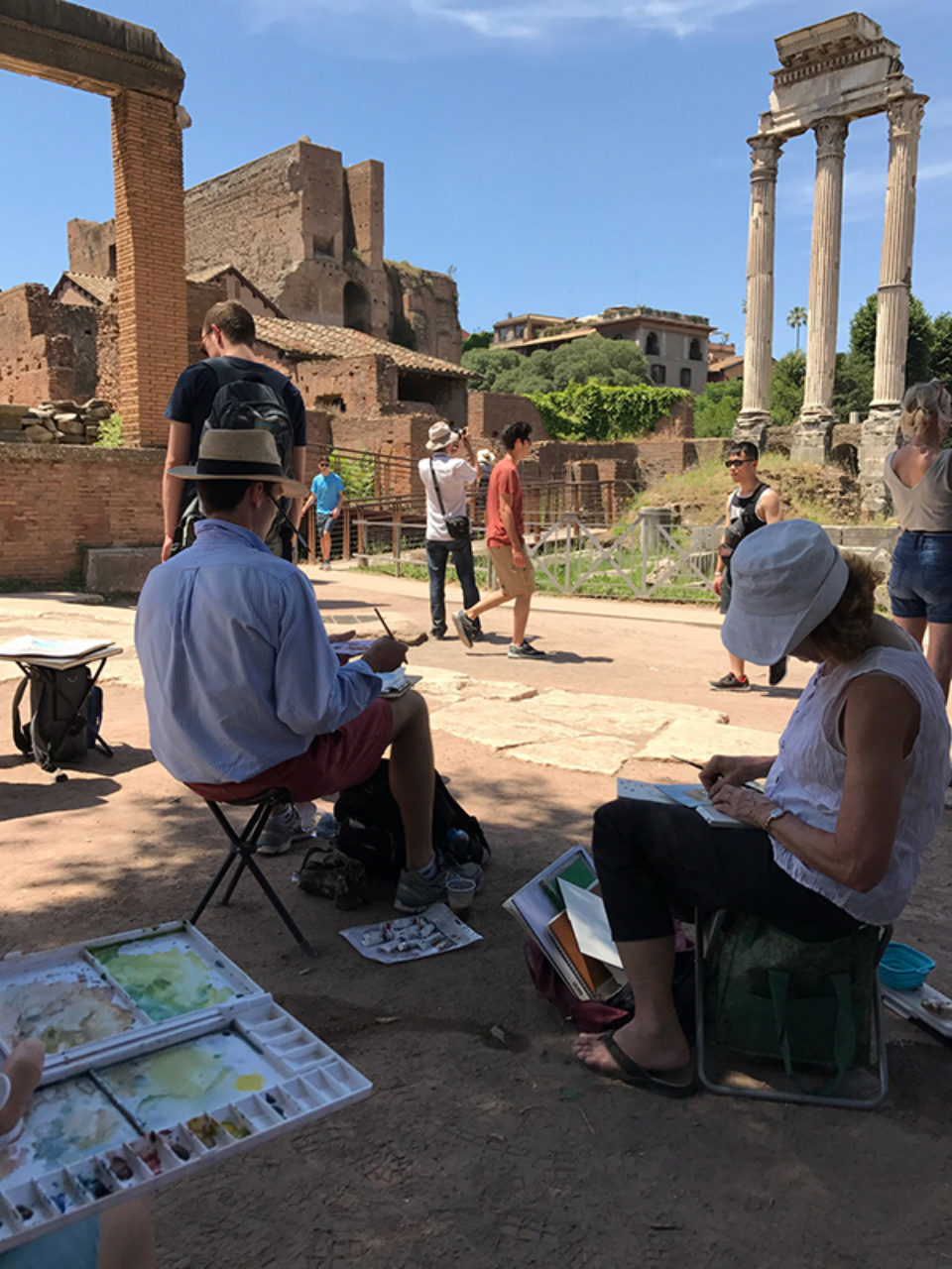 Tour participants sketch on location in the Roman Forum