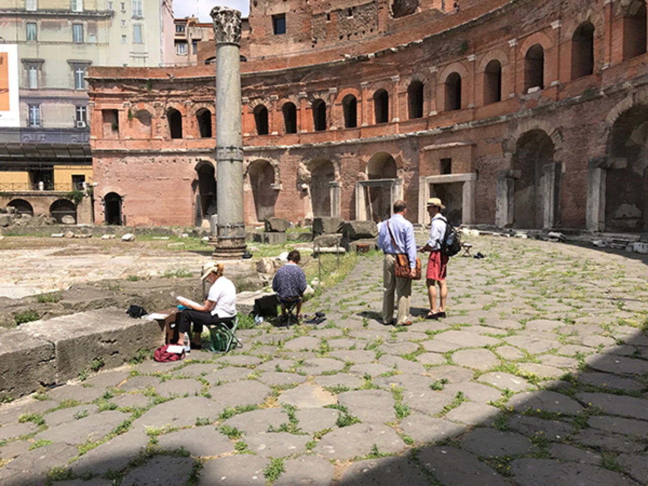 Tour participants sketch on location at Trajan's Market