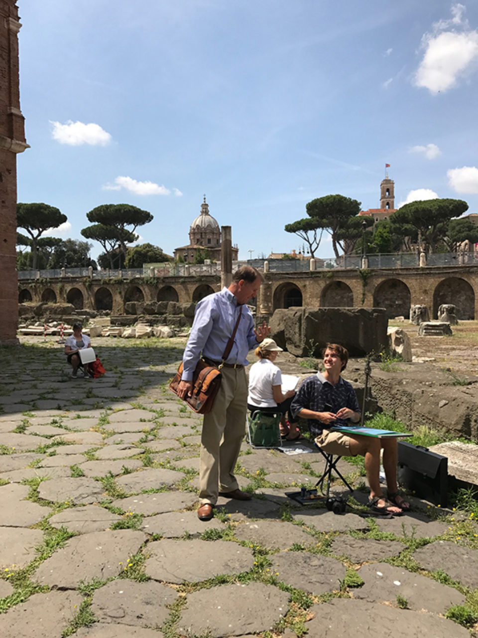 Tour participants sketch on location at Trajan's Market