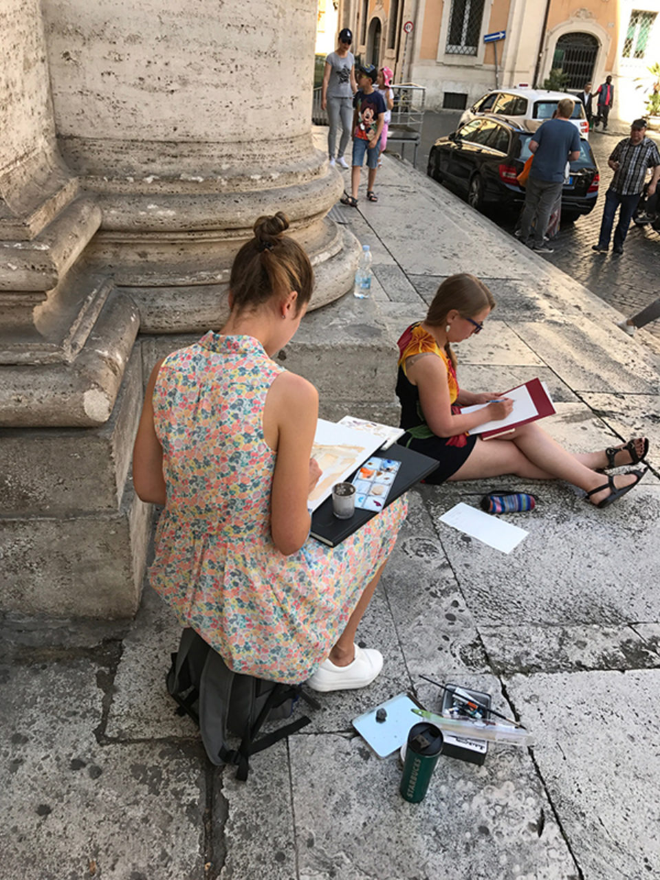 Tour participants sketch at Piazza Sant'Ignazio in Rome