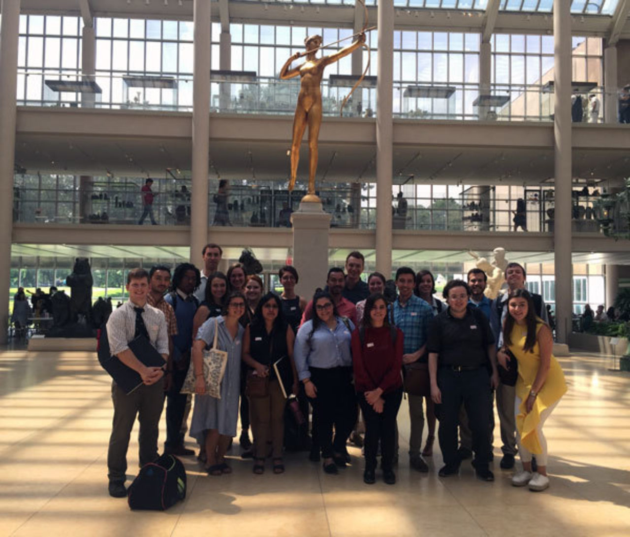 The Summer Studio group stands in front of the statue of Diana at The Metropolitan Museum of Art