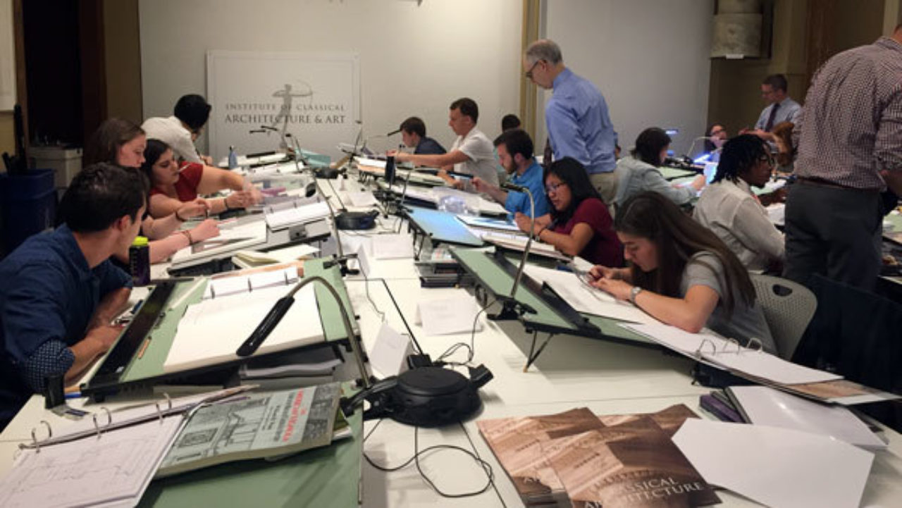 Students work on their drawings during the afternoon class