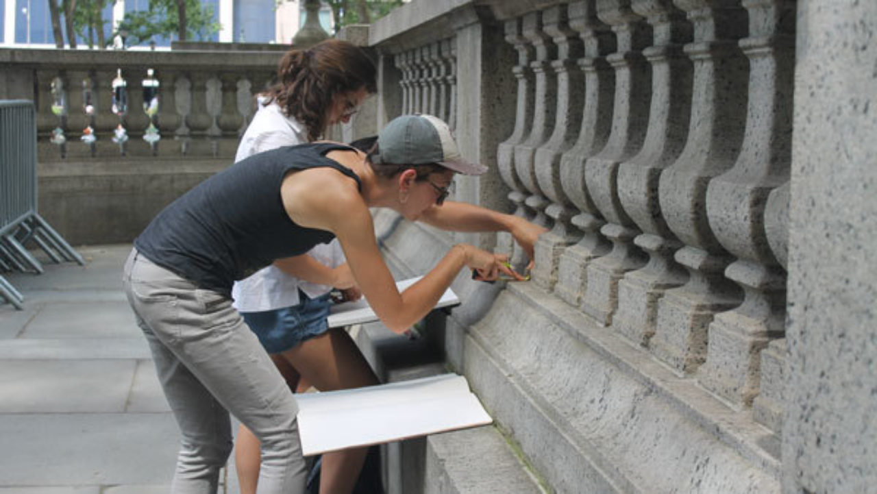 Students measure balustrades in Bryant Park, NY