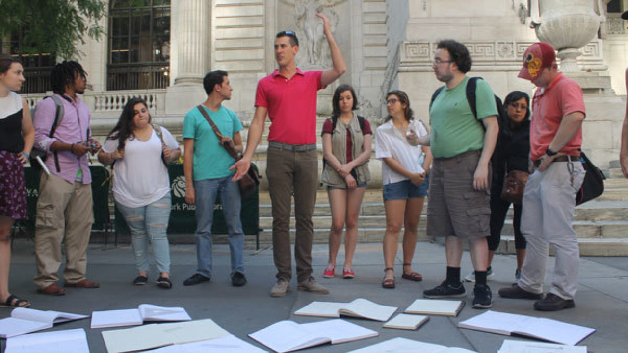 Led by Kellen Krause, students compare their sketches outside the New York Public Library