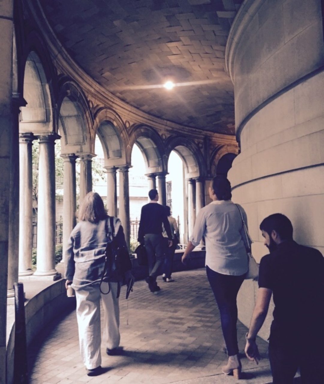 Students admiring the tiling as they continue the tour